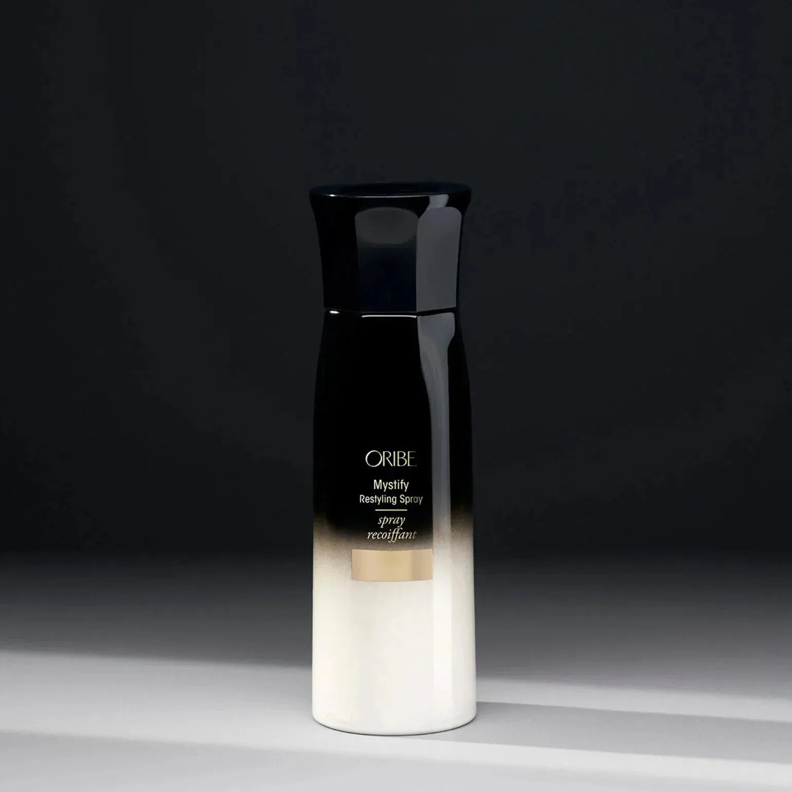 Oribe Mystify Restyling Spray in 175ml bottle, versatile hair spray for flexible styling and hold.