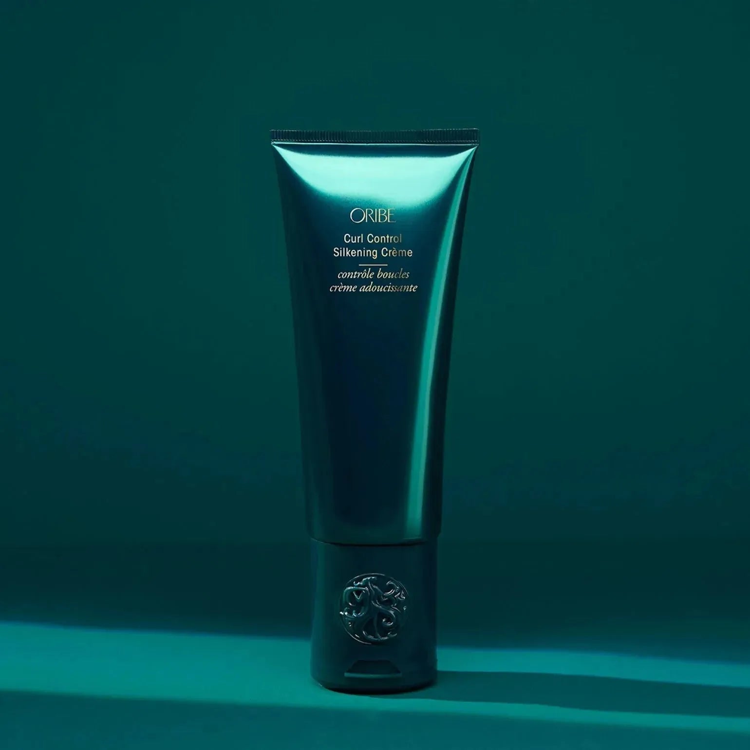 Oribe Curl By Definition Crème hair styling cream in 175ml jar, designed for defining and styling curly hair.
