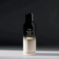 Oribe Imperial Blowout Transformative Styling Crème in 150ml jar, creamy hair styling cream for smooth, shiny hair.