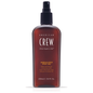 American Crew Spray Gel with medium hold, 8.45 fl oz, in a clear bottle, designed for flexible hair styling and control