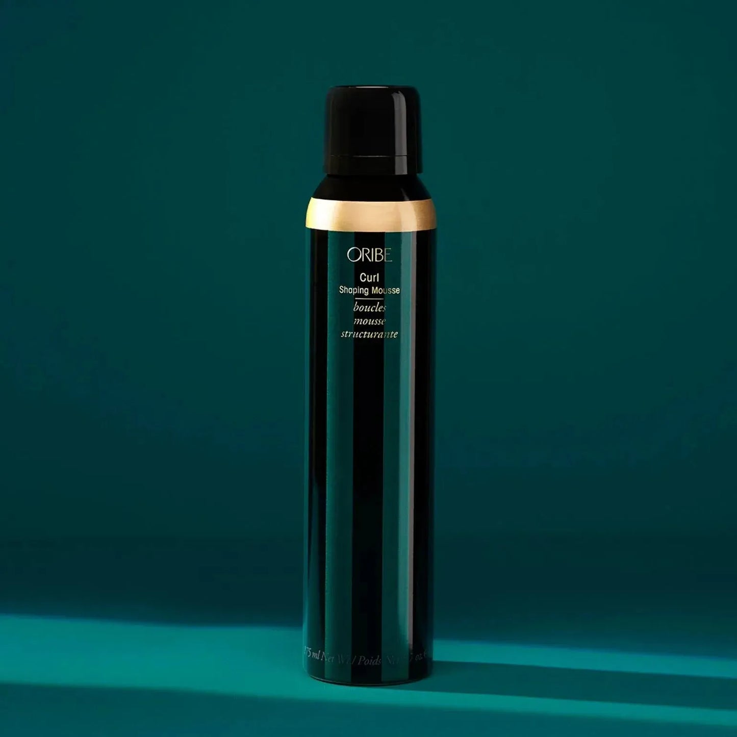 Oribe Curl Shaping Mousse in 175ml bottle, a hair styling mousse for defining and enhancing curls.