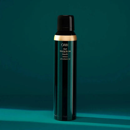 Oribe Curl Shaping Mousse in 175ml bottle, a hair styling mousse for defining and enhancing curls.
