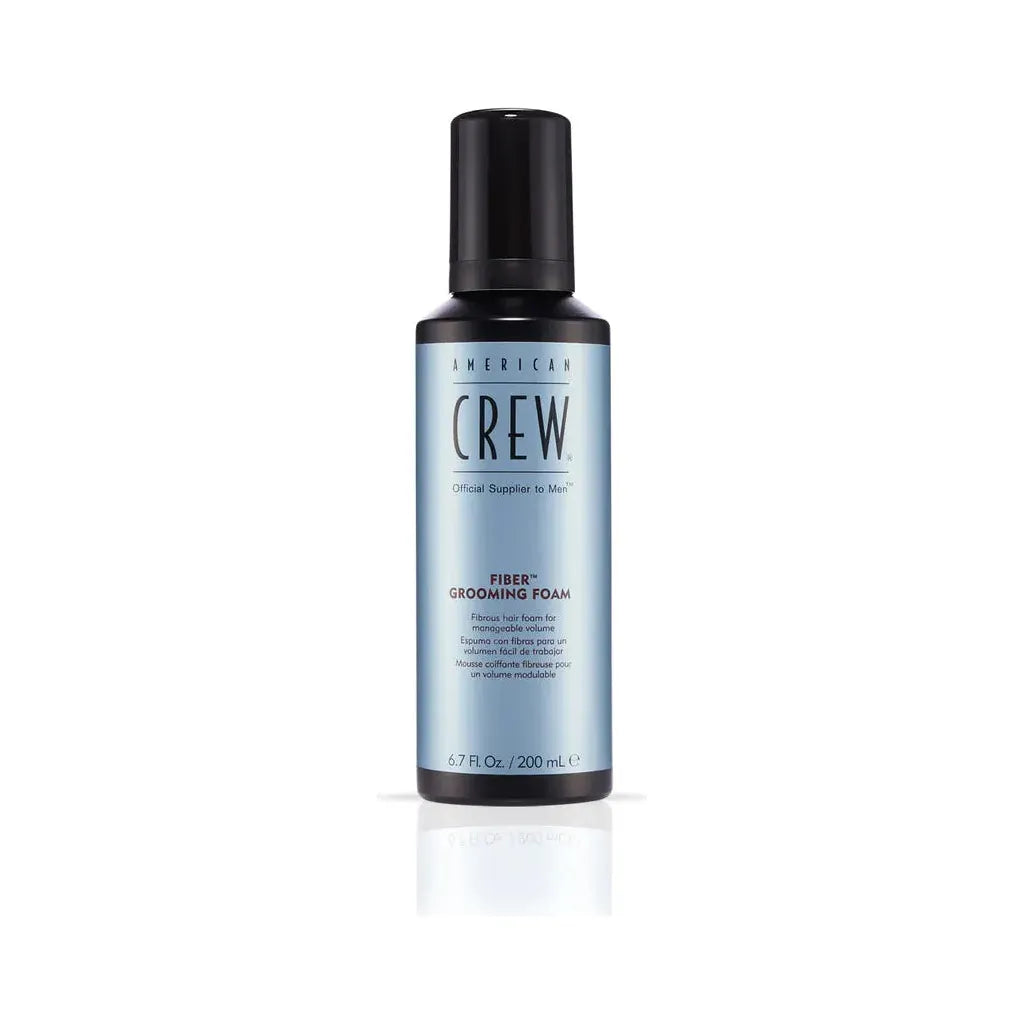 American Crew Fiber Grooming Foam in 6.7 oz bottle, a hair styling product with a foamy texture for textured hair styling.