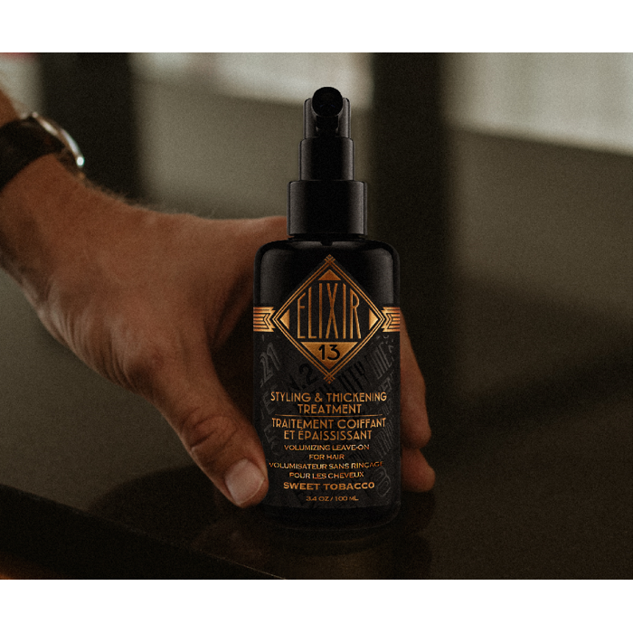 18.21 Man Made Elixir 13 Sweet Tobacco hair styling treatment in 3.4 oz bottle, thickening and styling for textured hair.