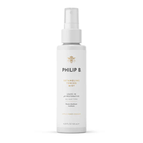 Philip B. Detangling Toning Mist spray bottle, 4.23 oz, for nourishing and detangling hair with toning benefits.
