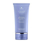 Alterna Caviar Restructuring Bond Repair Leave-in Protein Cream for hair, 5.1 oz, in a white tube with black cap.