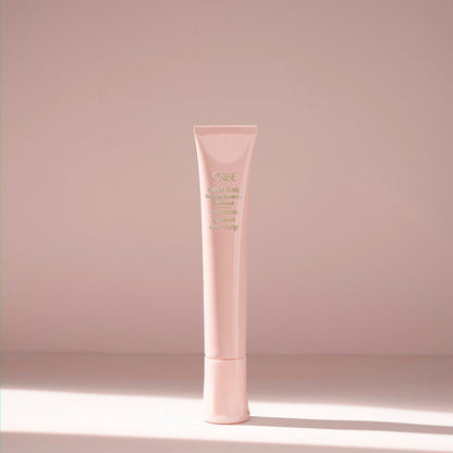 Oribe Serene Scalp Soothing Level-On Treatment in 50ml bottle, a calming hair treatment for scalp care.