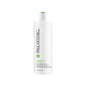 Paul Mitchell Super Skinny Daily Treatment bottle for hair, 33.8 oz, with sleek packaging and product label visible.