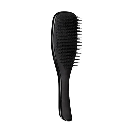 Black Tangle Teezer mini hairbrush for detangling, designed for smooth, snag-free hair, by Pasteur Pharmacy.