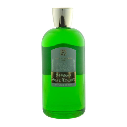 Geo. F. Trumper Green Floreka Hairdressing 100ml bottle, natural floral scent, professional hairdressing product, clear and stylish packaging