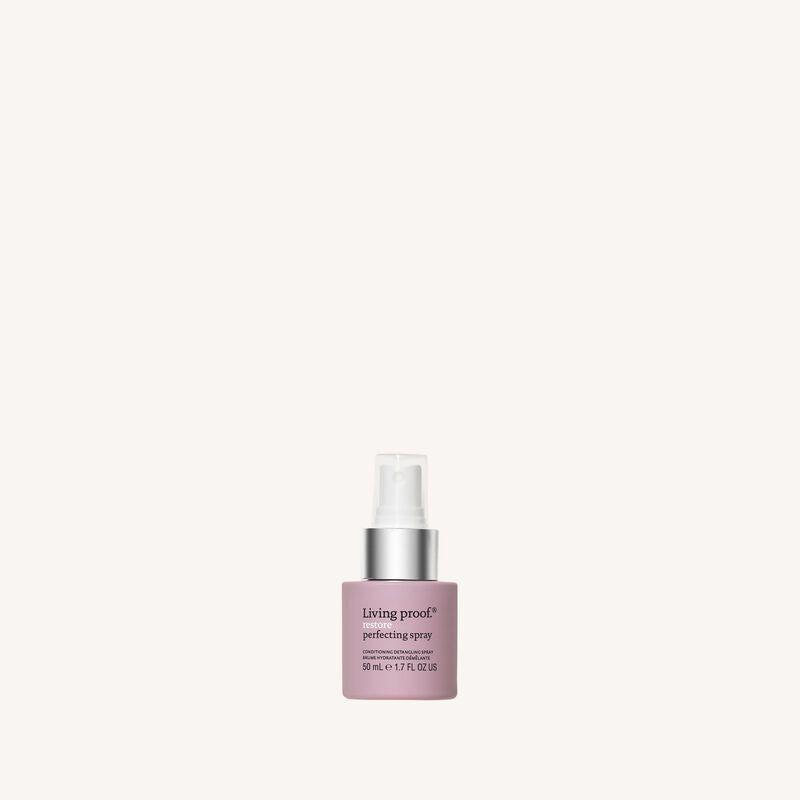 Living Proof Restore Perfecting Hairspray 1.7 oz bottle, lightweight styling spray for hold and shine.