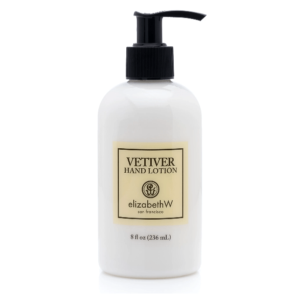 Elizabeth W Vetiver Hand Lotion in 8oz bottle by Pasteur Pharmacy, creamy texture and soothing vetiver scent visible in image.