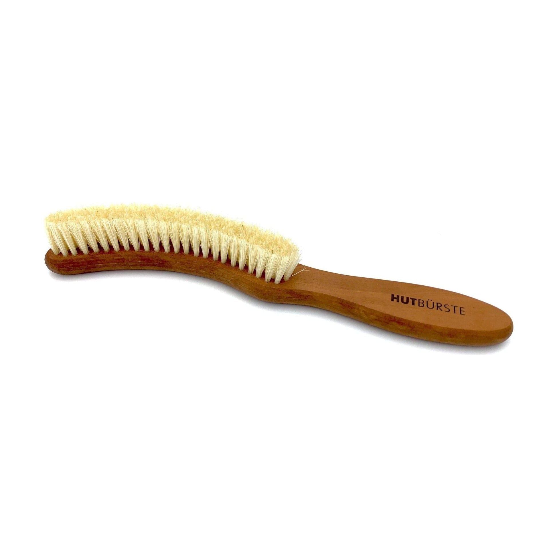 Dural Hat Brush by Pasteur Pharmacy with light natural bristles and pear wood handle for gentle hat cleaning and maintenance.