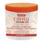 Cantu Grow Strong Treatment in 6 oz bottle, a health and beauty product for strengthening hair, displayed in a natural setting.