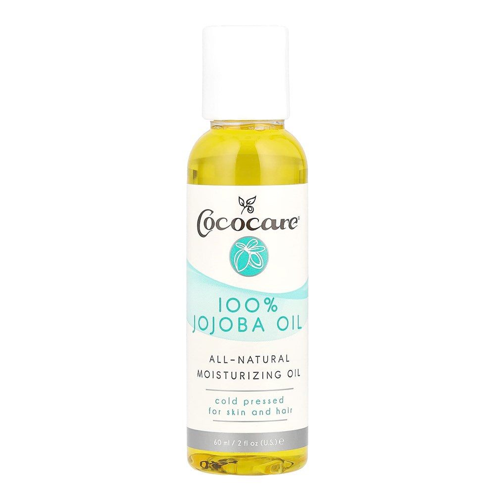 Cococare Natural Jojoba Oil in a 2 fl oz bottle, used for skincare and hair care, with a clear view of the product label.