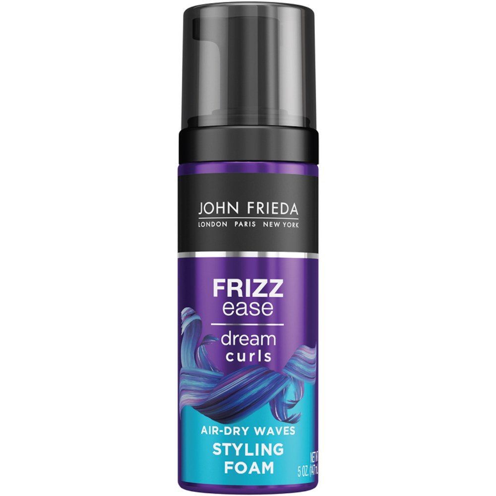 John Frieda Frizz Ease Dream Curls Air Dry Waves Styling Foam for curly hair, displayed in a bottle with a pump.