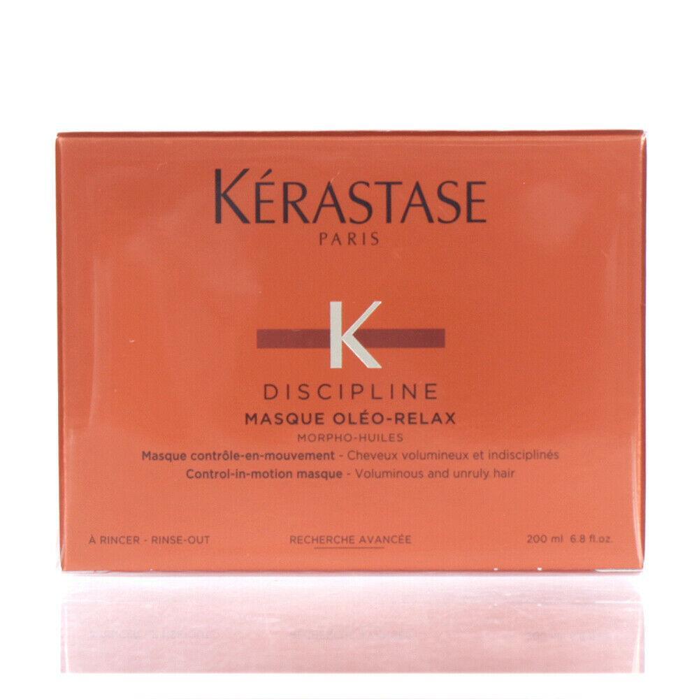 Kerastase Discipline Masque Oleo Relax for hair repair and softness, shown in a sleek jar with a creamy texture.