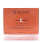 Kerastase Discipline Masque Oleo Relax for hair repair and softness, shown in a sleek jar with a creamy texture.