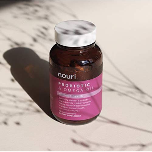 Nouri Women's Health Probiotic and Omega vegan capsules in a bottle, dietary supplement for digestive and overall health.