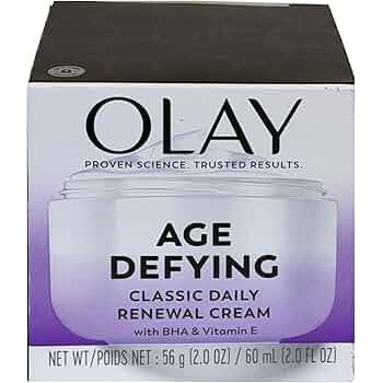 Olay Age Defying Classic Daily Renewal Cream face moisturizer in 2 oz jar, soothing skincare for aging skin.