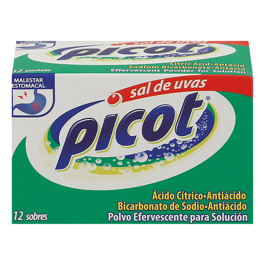 Picot® Sal de Uvas effervescent antacid powder in a clear glass with a spoon, used for indigestion relief.