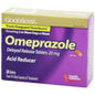 Good Sense Omeprazole delayed release acid reducer tablets in blister pack, 20 mg, shown in close-up.