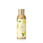 Thymes Lemon Leaf home fragrance mist in a clear glass bottle with a white spray nozzle, designed for refreshing home ambiance.