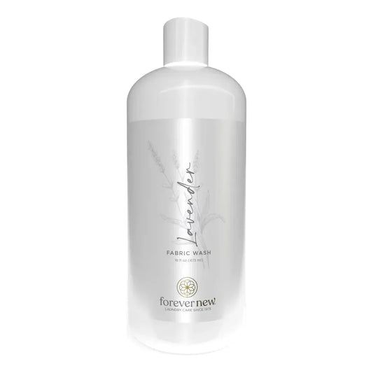 Forever New Lavender Fabric Wash laundry detergent in 16 oz bottle, gentle on fabrics, with a lavender scent for fresh laundry.