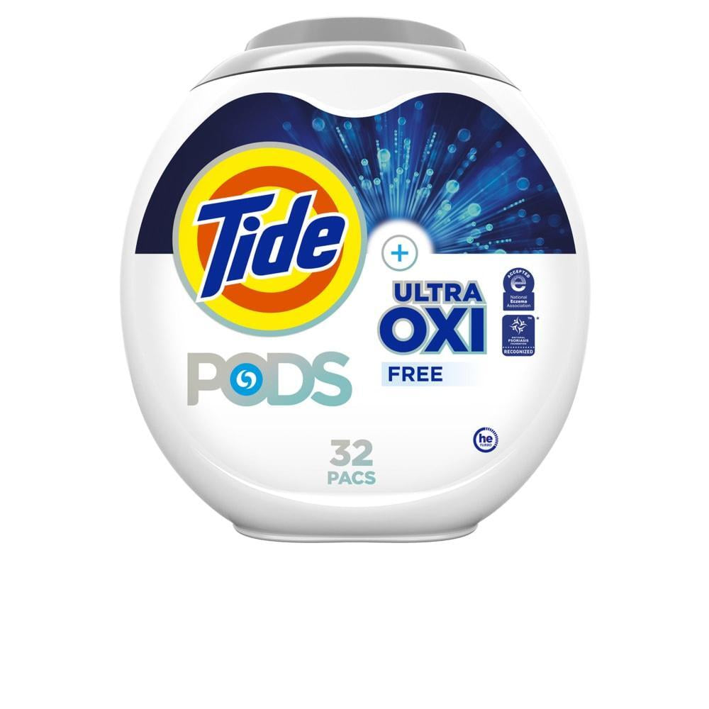 Tide Pods Ultra Oxi Free Nature laundry detergent capsules in a clear plastic container with blue and white capsules inside.