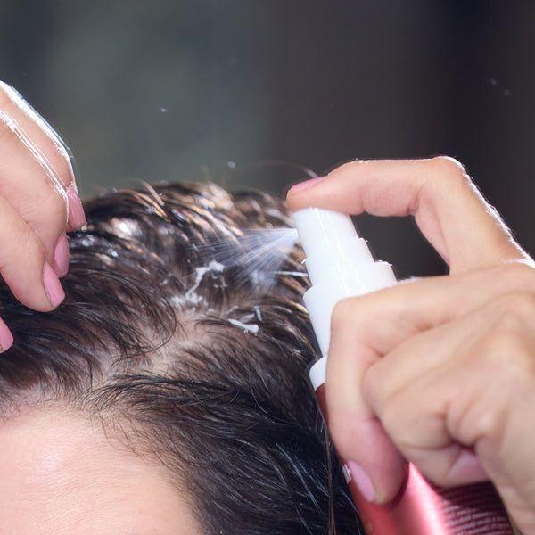 Philip B. Scalp Booster Leave-In Conditioner in 4.23 oz bottle, nourishing treatment for healthy scalp and hair.