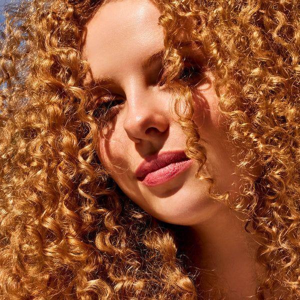 Philip B. Weightless Mega Curl Enhancer Leave-In Conditioner in 6 oz bottle, perfect for defining and moisturizing curls