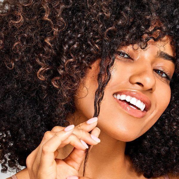 Philip B. Weightless Mega Curl Enhancer Leave-In Conditioner in 6 oz bottle, ideal for defining and enhancing curls.
