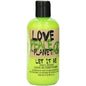 Tigi Love Peace & The Planet Let It Be Cherry Almond Leave-In Conditioner bottle, 250ml, featuring a black and colorful packaging design.