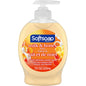 Softsoap Moisturizing Liquid Hand Soap Pump with Milk & Honey scent, 7.5 fl oz bottle, displayed in a bathroom setting.