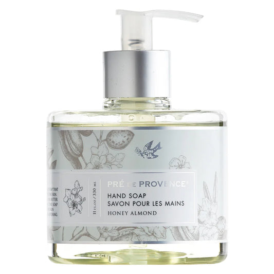 Liquid hand soap from Pre de Provence Honey Almond collection with sea salt, featuring natural ingredients and elegant packaging.