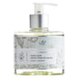 Liquid hand soap from Pre de Provence Honey Almond collection with sea salt, featuring natural ingredients and elegant packaging.