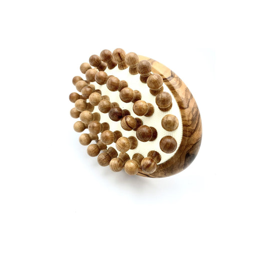 Dural Massage Brush by Pasteur Pharmacy with olive wood and wooden knobbles for soothing skin massage.