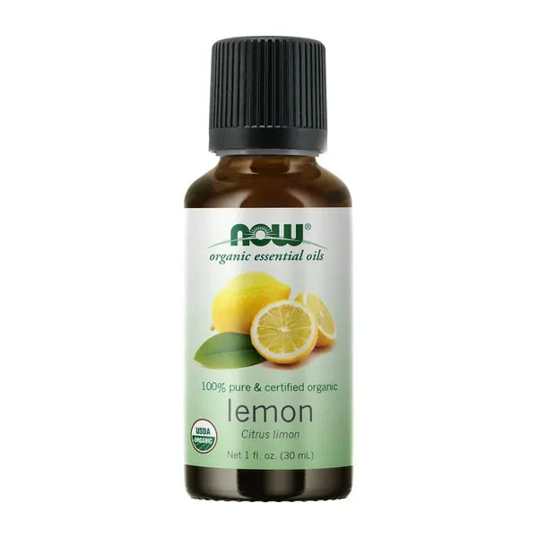 Organic lemon essential oil massage oil in a 30ml bottle by NOW, natural and aromatic for soothing massage sessions.