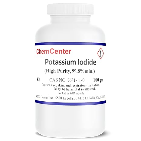 Potassium Iodide (KI) powder in a 100-gram package, medical supply from Pasteur Pharmacy with white powder visible.