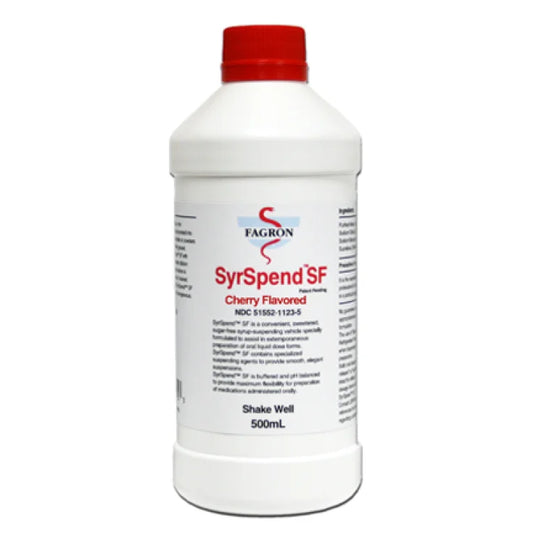 Cherry-flavored SyrSpend SF liquid suspending vehicle in a 500 mL bottle by Pasteur Pharmacy, used for medical suspensions.
