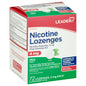 Leader Stop Smoking Aid 4 mg mint-flavored lozenges in a medicine cabinet, designed to help reduce cigarette cravings.