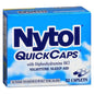Pasteur Pharmacy Nytol Quick Caps nighttime sleep aid stored in a medicine cabinet, with packaging and capsules visible inside.