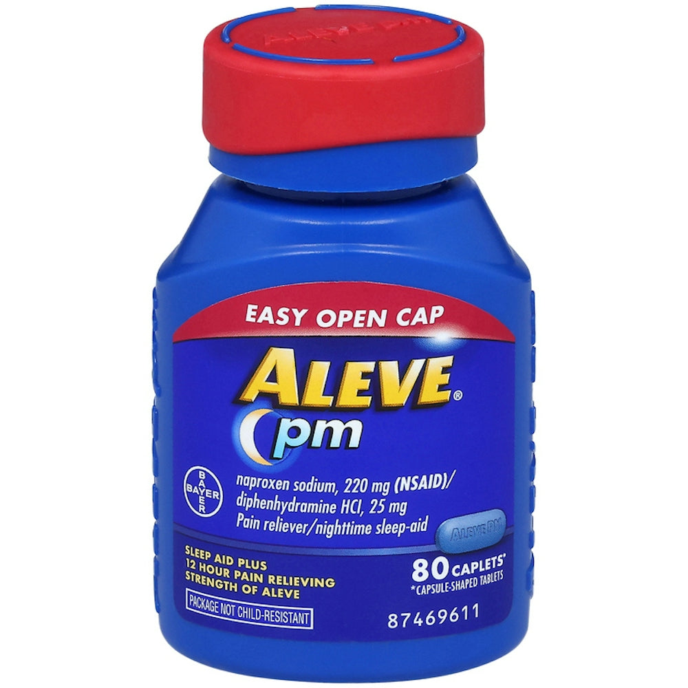 Aleve PM pain reliever and sleep aid caplets in a bottle, containing naproxen sodium 220mg, designed for nighttime relief.