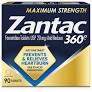 Zantac SDK FS Un 16 medicine bottle from Pasteur Pharmacy, used for acid reflux relief, with label showing product details.