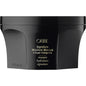 Oribe Signature Moisture Masque in a jar, a hydrating hair treatment for deep moisture and nourishment.