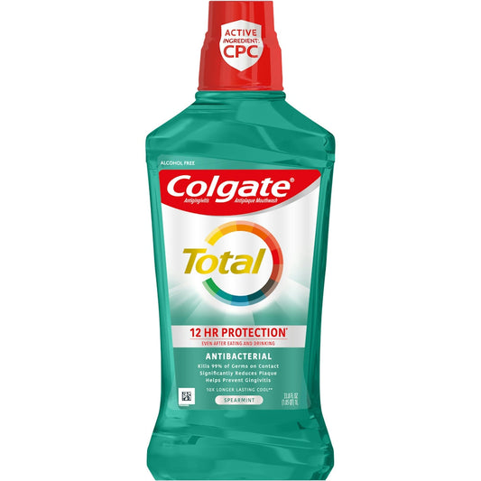 Colgate Total Advanced Mouthwash Spearmint Surge bottle, 33.81 fl oz, in a clear plastic container with a white and green label.