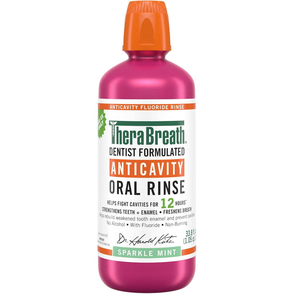 TheraBreath Healthy Smile Sparkle Mint Mouthwash in a 16 Fl Oz bottle, featuring clear liquid and mint flavor label.