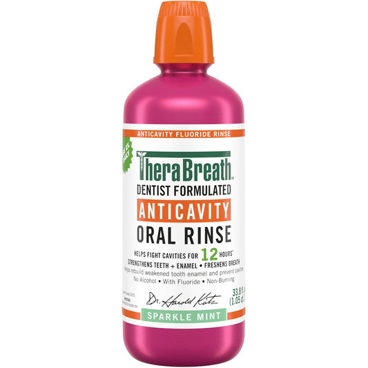 TheraBreath Healthy Smile Sparkle Mint Mouthwash in a 16 Fl Oz bottle, featuring clear liquid and mint flavor label.