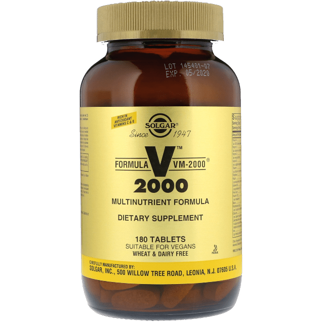 Solgar Formula VM-2000 multinutrient system in a bottle of 180 tablets, featuring various vitamins and minerals.