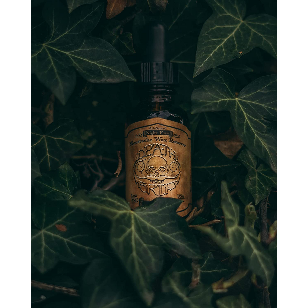 Death Grip Night Fury mustache wax remover by Pasteur Pharmacy, 1 oz, with a bottle and applicator in the image.